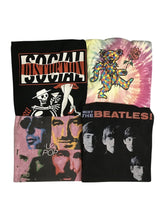 An image of four different vintage band tees 