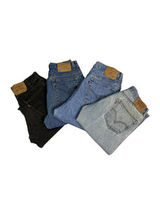 An image of four different pairs of men’s vintage denim jeans from Levi Straus 
