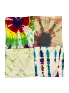 An image of four different vintage tie-dye shirts
